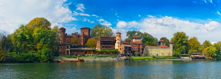 Beautiful panoramic view on antique castle Borgo Medioevale city garden park, Turin city garden across river Po. Italy holidays vacations famous sightseeing tours. Italy Italian architecture